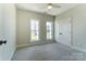Bedroom showcasing two large windows with natural light and a closet at 3432 Greene Rd, Monroe, NC 28110