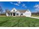 Beautiful single-Gathering home with white siding, stone accents, green shutters, and a well-maintained front lawn at 3432 Greene Rd, Monroe, NC 28110