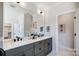 Elegant bathroom featuring double sinks and a large mirror at 3436 Greene Rd, Monroe, NC 28110