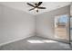 Bright bedroom with ceiling fan and large window at 3436 Greene Rd, Monroe, NC 28110