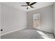 Bright bedroom with ceiling fan and large window at 3436 Greene Rd, Monroe, NC 28110