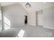 Spacious bedroom with high ceilings and plush carpeting at 3436 Greene Rd, Monroe, NC 28110