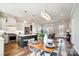 Open concept kitchen with dining area and living room view at 3436 Greene Rd, Monroe, NC 28110