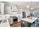 Spacious kitchen with island, stainless steel appliances, and hardwood floors at 3436 Greene Rd, Monroe, NC 28110
