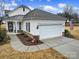 Craftsman style home with attached garage and manicured lawn at 3935 Yosemite Way, Fort Mill, SC 29707