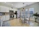 Well-equipped kitchen with stainless steel appliances and breakfast area at 3935 Yosemite Way, Fort Mill, SC 29707