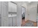 Bright laundry room with washer, dryer, and cabinets at 3935 Yosemite Way, Fort Mill, SC 29707