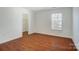 Bedroom with wood flooring and closet at 4005 Linville Falls Ln, Monroe, NC 28110