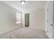 Bedroom with carpet and closet at 4005 Linville Falls Ln, Monroe, NC 28110