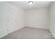 Bright bedroom with closet and carpet at 4005 Linville Falls Ln, Monroe, NC 28110