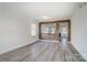 Dining room with wood accent wall and grey flooring at 4005 Linville Falls Ln, Monroe, NC 28110