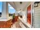 Brick walkway leading to a charming red front door at 4005 Linville Falls Ln, Monroe, NC 28110