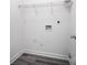 Laundry closet with shelving and hookups for washer and dryer at 4005 Linville Falls Ln, Monroe, NC 28110