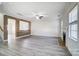 Spacious living room with a fireplace and wood accent wall at 4005 Linville Falls Ln, Monroe, NC 28110
