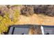 Aerial view showing house and lot, surrounded by trees at 4109 Pebblebrook Sw Cir, Concord, NC 28027