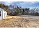 Large backyard with open space and trees at 4109 Pebblebrook Sw Cir, Concord, NC 28027