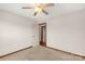 Bedroom with ceiling fan, carpet, and door to hallway at 4641 Hickory Grove Rd, Sharon, SC 29742