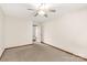 Spacious bedroom with ceiling fan, carpet flooring and door to bathroom at 4641 Hickory Grove Rd, Sharon, SC 29742