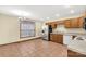 Kitchen with wood cabinets, tile floor and appliances at 4641 Hickory Grove Rd, Sharon, SC 29742