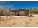 Metal workshop with roll-up door and covered area at 4641 Hickory Grove Rd, Sharon, SC 29742