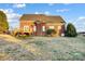 Brick house with deck and grassy backyard at 5517 Cyrus Lee Ln, Monroe, NC 28110