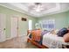 Serene bedroom featuring a wood bed frame and ceiling fan at 5517 Cyrus Lee Ln, Monroe, NC 28110