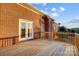 Brick home with wooden deck at 5517 Cyrus Lee Ln, Monroe, NC 28110