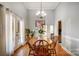 Bright dining room with hardwood floors and French doors at 5517 Cyrus Lee Ln, Monroe, NC 28110