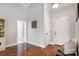 Bright entryway with hardwood floors and built-in shelving at 5517 Cyrus Lee Ln, Monroe, NC 28110