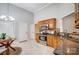 This kitchen offers ample cabinet space and granite countertops at 5517 Cyrus Lee Ln, Monroe, NC 28110