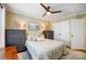 Bright bedroom with double closets and ceiling fan at 8002 Cottsbrooke Dr, Huntersville, NC 28078