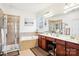 Elegant bathroom with double vanity, soaking tub, and shower at 8814 Beaver Creek Dr, Charlotte, NC 28269