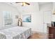 Charming bedroom with a full-size bed, dresser, and window at 8814 Beaver Creek Dr, Charlotte, NC 28269