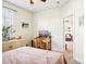Bedroom with a double bed, workspace, and access to another room at 8814 Beaver Creek Dr, Charlotte, NC 28269