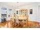 Formal dining room with hardwood floors, and a china cabinet at 8814 Beaver Creek Dr, Charlotte, NC 28269