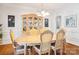Formal dining room with hardwood floors, and a china cabinet at 8814 Beaver Creek Dr, Charlotte, NC 28269