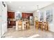 Eat-in kitchen with wood cabinets, island, and stainless steel appliances at 8814 Beaver Creek Dr, Charlotte, NC 28269