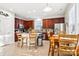 Eat-in kitchen with wood cabinets, island, and stainless steel appliances at 8814 Beaver Creek Dr, Charlotte, NC 28269