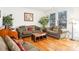 Comfortable living room featuring hardwood floors and ample natural light at 8814 Beaver Creek Dr, Charlotte, NC 28269