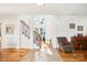 Open living space with hardwood floors and staircase at 8814 Beaver Creek Dr, Charlotte, NC 28269