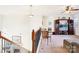 Upstairs loft area features a sitting area and built-in entertainment center at 8814 Beaver Creek Dr, Charlotte, NC 28269