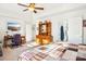 Main bedroom with a dresser, desk and TV at 8814 Beaver Creek Dr, Charlotte, NC 28269