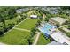 Aerial view of community pool, tennis courts, and green spaces at 917 Black Beard Dr, Denver, NC 28037