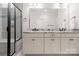 Elegant bathroom with double vanity and a large walk-in shower at 917 Black Beard Dr, Denver, NC 28037