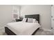 Cozy bedroom with a comfortable bed and built-in workspace at 917 Black Beard Dr, Denver, NC 28037