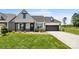 Craftsman style home with a two-car garage and manicured lawn at 917 Black Beard Dr, Denver, NC 28037