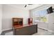 Home office features built-in shelving and hardwood floors at 917 Black Beard Dr, Denver, NC 28037