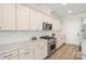 Modern kitchen with stainless steel appliances and granite countertops at 917 Black Beard Dr, Denver, NC 28037