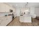 Spacious kitchen with large island, stainless steel appliances, and granite countertops at 917 Black Beard Dr, Denver, NC 28037