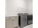 Laundry room with washer, dryer, and shelving at 917 Black Beard Dr, Denver, NC 28037